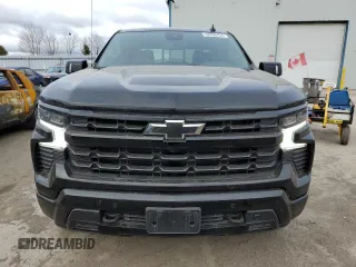 2025 Chevrolet Silverado 1500 with VIN 1GCUKEE86SZ159322, listed as a Copart auction lot 52690435 with 4,975 mi miles and Salvage Title. Bid and sale history available at DreamBid. Image 5.