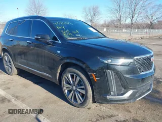 2022 Cadillac XT6 Premium Luxury with VIN 1GYKPDRS5NZ122060, listed as a IAAI auction lot 41584678 with 36,036 mi miles. Bid and sale history available at carsss.com. Image 6.