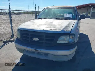2000 Ford F-150 XL with VIN 1FTZF172XYNA19690, listed as a IAAI auction lot 41721021 with 181,702 mi miles and . Bid and sale history available at DreamBid. Image 6.