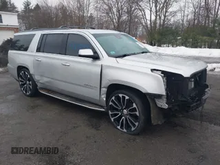 2015 GMC Yukon XL SLT with VIN 1GKS2HKC0FR287860, listed as a IAAI auction lot 41638921 with 213,214 mi miles. Bid and sale history available at carsss.com. Image 1.