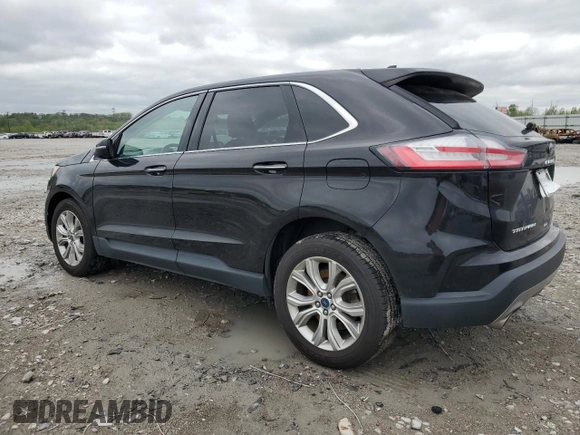 2022 Ford Edge Titanium with VIN 2FMPK4K94NBA30860, listed as a Copart auction lot 54001865 with 94,559 mi miles and Salvage title. Bid and sale history available at DreamBid. Image 2.