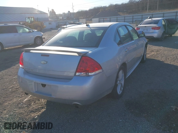 2013 Chevrolet Impala LTZ with VIN 2G1WC5E31D1190461, listed as a IAAI auction lot 41381242 with 205,833 mi miles and . Bid and sale history available at DreamBid. Image 4.