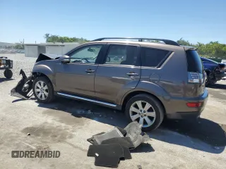 2010 Mitsubishi Outlander SE z VIN JA4AS3AW3AZ004523, wystawiony jako Copart lot #52864695 z przebiegiem 133 500 mil mil oraz Szkoda całkowita • Salvage title. Historia ofert i sprzedaży dostępna na DreamBid. Obrazek 2.