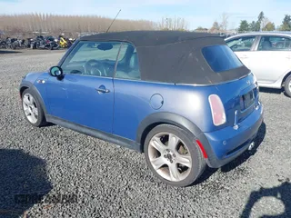2005 MINI Convertible S with VIN WMWRH33455TF82408, listed as a IAAI auction lot 41857791 with 133,824 mi miles and . Bid and sale history available at DreamBid. Image 3.