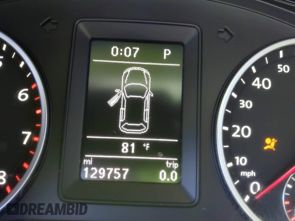 2013 Volkswagen Tiguan SE z VIN WVGBV7AX2DW006816, wystawiony jako IAAI lot #41702820 z przebiegiem 129 757 mil mil oraz . Historia ofert i sprzedaży dostępna na DreamBid. Obrazek 7.