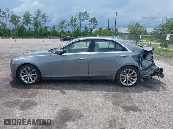2019 Cadillac CTS Luxury RWD with VIN 1G6AR5SS4K0122114, listed as a IAAI auction lot 42556986 with 74,325 mi miles and . Bid and sale history available at DreamBid. Image 13.