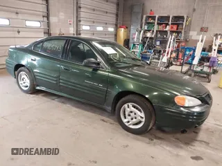2000 Pontiac Grand Am SE1 with VIN 1G2NF52T6YC546633, listed as a IAAI auction lot 41905243 with 118,017 mi miles. Bid and sale history available at carsss.com. Image 1.