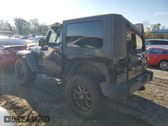 2015 Jeep Wrangler Willys Wheeler with VIN 1C4AJWAG8FL648645, listed as a Copart auction lot 74334884 with Not provided miles and Salvage title. Bid and sale history available at DreamBid. Image 2.