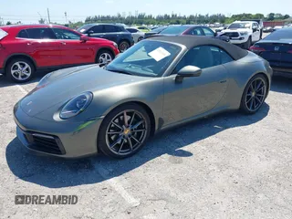 2020 Porsche 911 Carrera S with VIN WP0CB2A97LS263238, listed as a IAAI auction lot 42021346 with 23,899 mi miles. Bid and sale history available at carsss.com. Image 2.