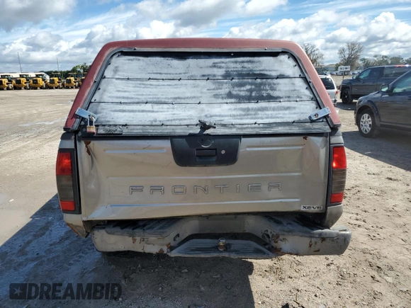 2004 Nissan Frontier XE with VIN 1N6ED29X24C436064, listed as a Copart auction lot 58916434 with 277,026 mi miles and Salvage title. Bid and sale history available at DreamBid. Image 6.