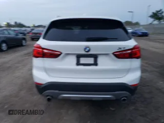 2018 BMW X1 sDrive28i with VIN WBXHU7C35J5H43995, listed as a Copart auction lot 71650602 with 80,437 mi miles. Bid and sale history available at carsss.com. Image 6.