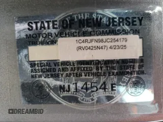 2018 Jeep Grand Cherokee with VIN NJ1454E, listed as a Copart auction lot 48051693 with 66,894 mi miles and Salvage title. Bid and sale history available at DreamBid. Image 13.