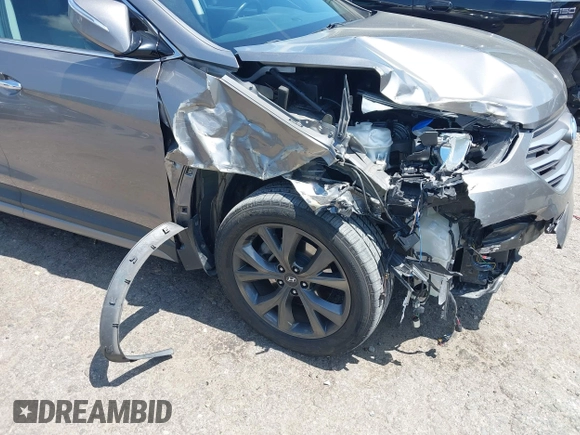 2017 Hyundai Santa Fe Ultimate z VIN 5NMZW4LA7HH047989, wystawiony jako IAAI lot #42051500 z przebiegiem 75 747 mil mil oraz . Historia ofert i sprzedaży dostępna na DreamBid. Obrazek 6.