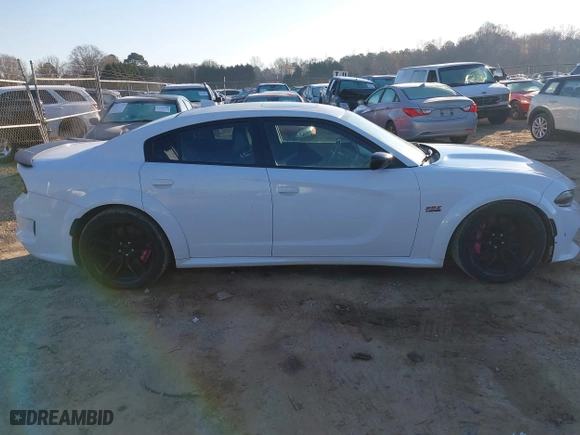 2020 Dodge Charger Scat Pack with VIN 2C3CDXGJ1LH217683, listed as a IAAI auction lot 41656722 with 70,758 mi miles. Bid and sale history available at carsss.com. Image 13.
