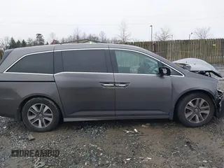 2015 Honda Odyssey Touring Elite with VIN 5FNRL5H92FB089627, listed as a IAAI auction lot 41115013 with Not Provided miles and . Bid and sale history available at DreamBid. Image 13.