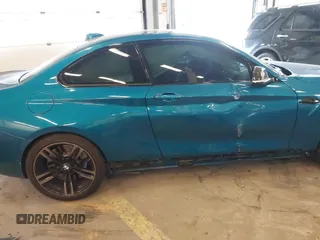 2018 BMW M2 z VIN WBS1J5C58JVD36727, wystawiony jako IAAI lot #41939937 z przebiegiem 31 959 mil mil oraz . Historia ofert i sprzedaży dostępna na DreamBid. Obrazek 19.