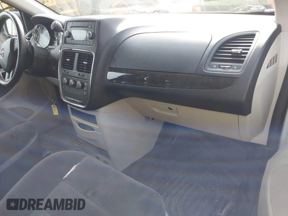 2014 Dodge Grand Caravan American Value with VIN 2C4RDGBG4ER227493, listed as a IAAI auction lot 41651263 with 206,169 mi miles and . Bid and sale history available at DreamBid. Image 5.