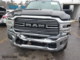 2022 Ram 2500 Laramie with VIN 3C6UR5FL2NG243857, listed as a IAAI auction lot 41736144 with 58,474 mi miles. Bid and sale history available at carsss.com. Image 6.