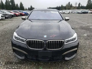 2018 BMW 7 Series M760i xDrive with VIN WBA7H6C55JG614811, listed as a Copart auction lot 44707433 with 27,542 mi miles. Bid and sale history available at carsss.com. Image 5.