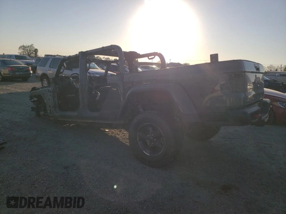 2021 Jeep Gladiator Rubicon z VIN 1C6JJTBMXML503128, wystawiony jako Copart lot #42813725 z przebiegiem Nie podano mil oraz Szkoda całkowita • Salvage title. Historia ofert i sprzedaży dostępna na DreamBid. Obrazek 2.