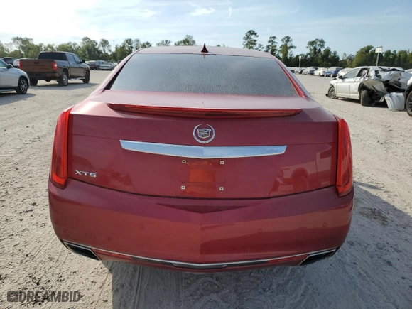 2014 Cadillac XTS Premium with VIN 2G61P5S33E9318036, listed as a Copart auction lot 77262324 with 131,588 mi miles and Salvage Title. Bid and sale history available at carsss.com. Image 6.