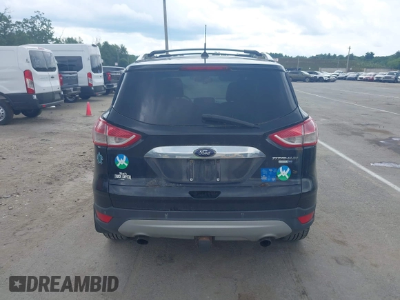 2015 Ford Escape Titanium with VIN 1FMCU9J92FUA96987, listed as a IAAI auction lot 42678423 with 188,956 mi miles and . Bid and sale history available at DreamBid. Image 16.