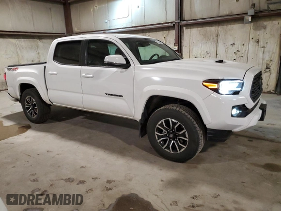 2023 Toyota Tacoma SR z VIN 3TMCZ5AN0PM651386, wystawiony jako Copart lot #51158185 z przebiegiem 23 642 mil mil oraz Szkoda całkowita • Salvage title. Historia ofert i sprzedaży dostępna na DreamBid. Obrazek 4.
