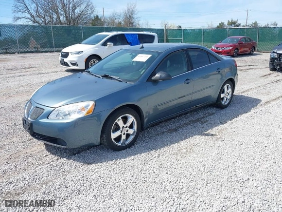 2005 Pontiac G6 GT with VIN 1G2ZH548654155010, listed as a IAAI auction lot 41847241 with 212,932 mi miles. Bid and sale history available at carsss.com. Image 2.