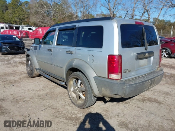 2007 Dodge Nitro SXT with VIN 1D8GT28K97W642118, listed as a IAAI auction lot 41276172 with 385,441 mi miles. Bid and sale history available at carsss.com. Image 3.
