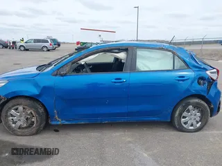 2021 Kia Rio S with VIN 3KPA25AD6ME402342, listed as a IAAI auction lot 41962804 with 41,197 mi miles and . Bid and sale history available at DreamBid. Image 14.