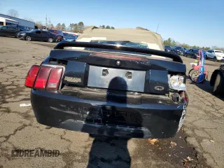 1999 Ford Mustang with VIN 1FAFP4443XF137375, listed as a Copart auction lot 82615074 with Not provided miles and Salvage title. Bid and sale history available at DreamBid. Image 6.