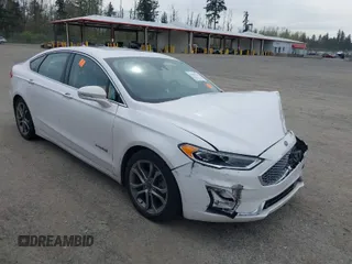 2019 Ford Fusion Hybrid Titanium with VIN 3FA6P0RU0KR227368, listed as a IAAI auction lot 42013716 with 62,722 mi miles. Bid and sale history available at carsss.com. Image 1.