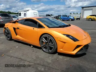 2013 Lamborghini Gallardo z VIN ZHWGU5AUXDLA13144, wystawiony jako Copart lot #62292543 z przebiegiem 15 171 mil mil oraz Szkody całkowita. Historia ofert i sprzedaży dostępna na DreamBid. Obrazek 4.