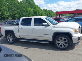 2014 GMC Sierra 1500 SLT with VIN 3GTU2VEC5EG548784, listed as a IAAI auction lot 42156738 with 118,809 mi miles and . Bid and sale history available at DreamBid. Image 13.