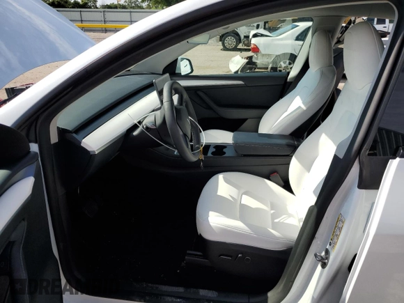 2023 Tesla Model Y Long Range with VIN 7SAYGAEE6PF795434, listed as a Copart auction lot 67507984 with 24,469 mi miles and Salvage Title. Bid and sale history available at DreamBid. Image 7.