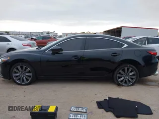 2020 Mazda 6 Grand Touring with VIN JM1GL1TY5L1513949, listed as a IAAI auction lot 40953540 with 55,616 mi miles and . Bid and sale history available at DreamBid. Image 14.