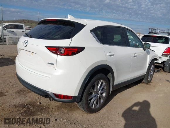 2019 Mazda CX-5 Grand Touring with VIN JM3KFBDM8K0518576, listed as a IAAI auction lot 41854296 with 88,706 mi miles and . Bid and sale history available at carsss.com. Image 4.