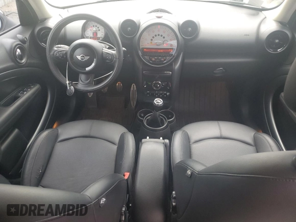 2014 MINI Countryman S z VIN WMWZC3C57EWP51864, wystawiony jako Copart lot #71233944 z przebiegiem 73 828 mil mil oraz Szkoda całkowita • Salvage title. Historia ofert i sprzedaży dostępna na DreamBid. Obrazek 8.