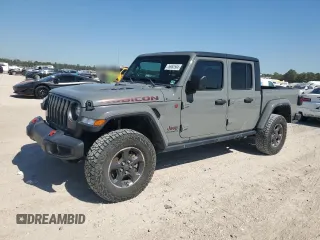 2022 Jeep Gladiator Rubicon с VIN 1C6JJTBG7NL132991, выставлен на аукционе Copart как лот 76983584 с пробегом 36 870 миль миль и На запчасти • Non repairable. История ставок и продаж доступна на DreamBid. Изображение 1.