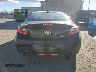 2023 Toyota GR86 with VIN JF1ZNBB12P9763031, listed as a Copart auction lot 81593314 with 7,411 mi miles and Salvage Title. Bid and sale history available at carsss.com. Image 6.