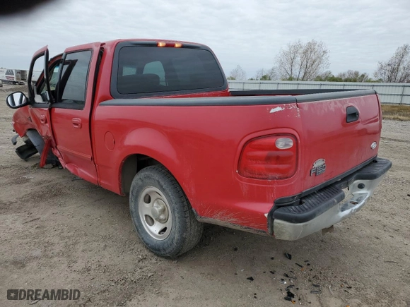 2001 Ford F-150 SuperCrew XLT with VIN 1FTRW07W41KF76325, listed as a Copart auction lot 89134945 with 262,868 mi miles and Salvage Title. Bid and sale history available at carsss.com. Image 2.