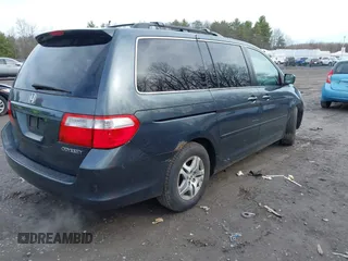 2005 Honda Odyssey EX-L with VIN 5FNRL38645B008281, listed as a IAAI auction lot 41985052 with 219,693 mi miles. Bid and sale history available at carsss.com. Image 4.