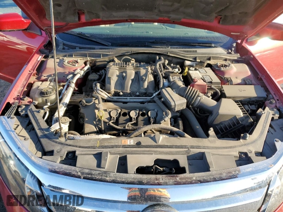 2012 Ford Fusion SEL with VIN 3FAHP0JG1CR265885, listed as a Copart auction lot 48516675 with 142,258 mi miles and Salvage Title. Bid and sale history available at DreamBid. Image 12.