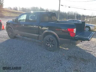 2017 Nissan Titan SV with VIN 1N6AA1E57HN516363, listed as a IAAI auction lot 41780611 with 114,749 mi miles. Bid and sale history available at carsss.com. Image 3.