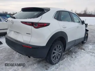 2021 Mazda CX-30 S with VIN 3MVDMBAL9MM221639, listed as a IAAI auction lot 41545920 with 57,239 mi miles and . Bid and sale history available at carsss.com. Image 4.