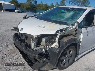 2014 Toyota Sienna SE with VIN 5TDXK3DC4ES487772, listed as a IAAI auction lot 41218295 with 153,368 mi miles and . Bid and sale history available at DreamBid. Image 6.