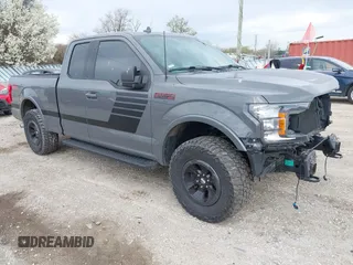 2018 Ford F-150 XL z VIN 1FTFX1E52JFA28414, wystawiony jako IAAI lot #42048799 z przebiegiem 146 044 mil mil oraz . Historia ofert i sprzedaży dostępna na DreamBid. Obrazek 1.