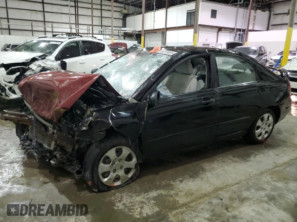 2009 Kia Spectra LX z VIN KNAFE221295625557, wystawiony jako Copart lot #89319855 z przebiegiem Nie podano mil oraz Nie do naprawy • Non repairable. Historia ofert i sprzedaży dostępna na DreamBid. Obrazek 1.