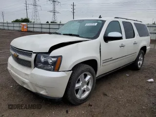 2011 Chevrolet Suburban LTZ with VIN 1GNSKKE32BR132054, listed as a Copart auction lot 57412915 with 136,926 mi miles and Salvage title. Bid and sale history available at DreamBid. Image 1.