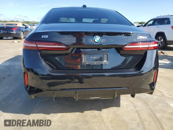 2024 BMW i5 M60 z VIN WBY43FK00RCP12947, wystawiony jako Copart lot #73754024 z przebiegiem Nie podano mil oraz Szkoda całkowita • Salvage title. Historia ofert i sprzedaży dostępna na DreamBid. Obrazek 10.